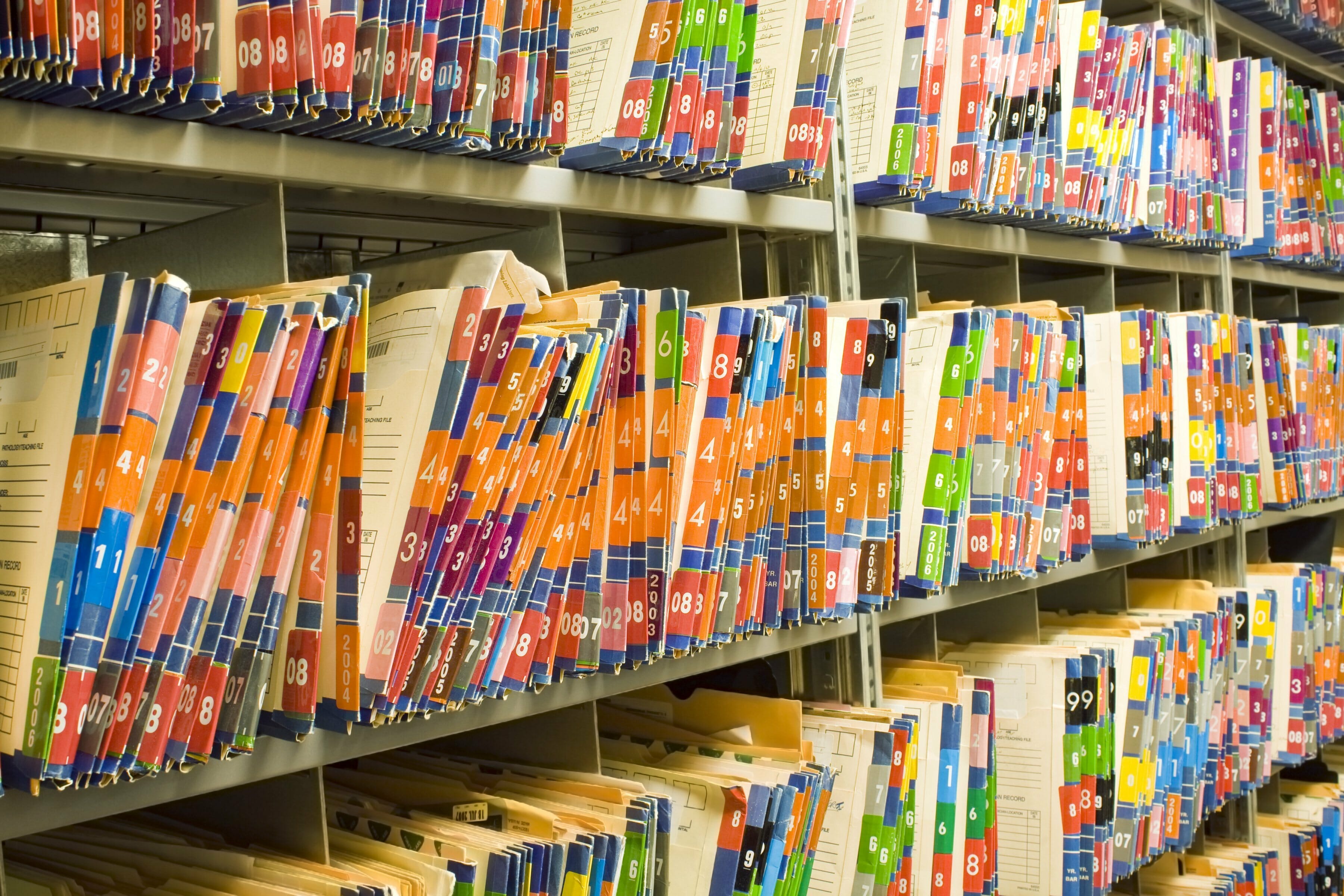 rows-of-colorful-medical-records-patient-charts-global-document